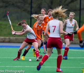 Maddie Pearce, England U16, clears her lines against Holland