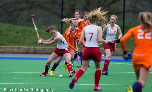 Maddie Pearce, England U16, clears her lines against Holland